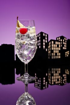 Metropolis tom collins or Gin Tonic cocktail cocktail in city skyline setting