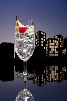 Metropolis tom collins or Gin Tonic cocktail cocktail in city skyline setting