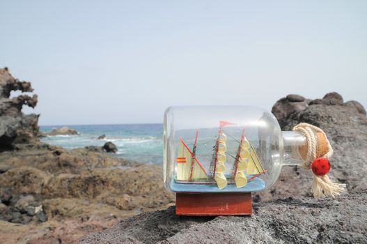 Sailing Ship in the Bottle near the Ocean