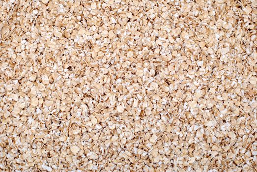 Porridge oats or oatmeal abstract background texture