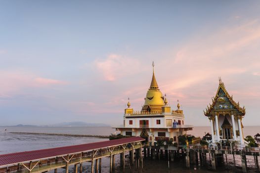 Beautiful twilight Phra Maha Pagoda Ganges Precha Prapakorn (Middle sea pagoda), Wat Hong Thong, Chachoengsao Province, Thailand.