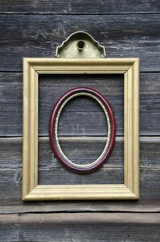 two picture frame on old wooden wall background