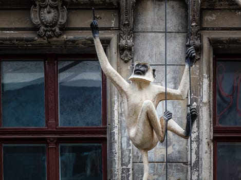 Old House Facade with Monkey Sculpture in Berlin, Germany