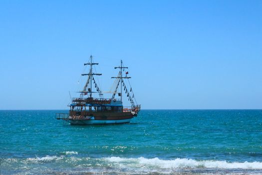 A small sailing vessel for sea trips near beach resort