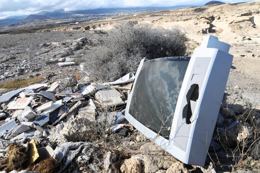 A Broken Gray Television Abandoned in the Desert