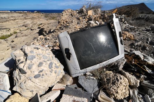 A Broken Gray Television Abandoned in the Desert