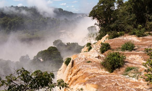 Flood swollen river leading to famous Iguassu Falls on border between Brazil and Argentina