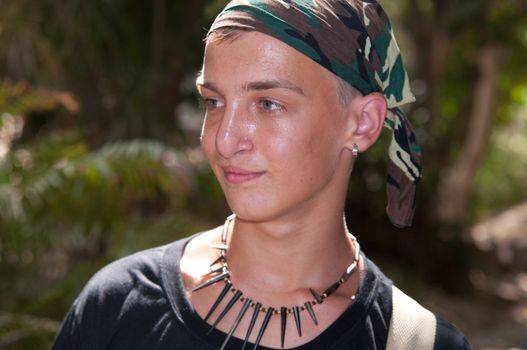 Portrait of a teenage boy in bandana.