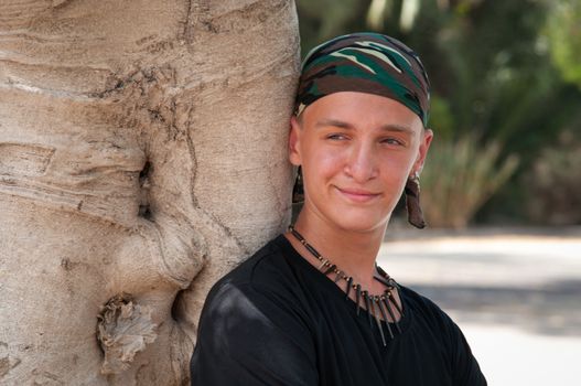 Portrait of a teenage boy in bandana.