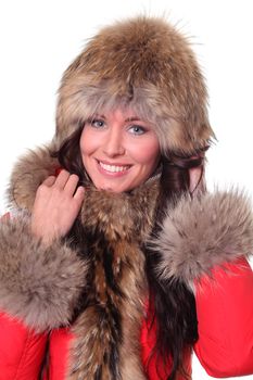 Portrait of a beautiful happy woman wearing fur
