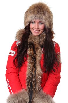 Portrait of a beautiful happy woman wearing fur