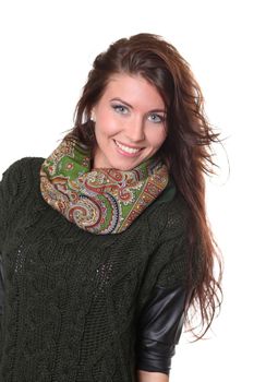 portrait of a beautiful happy woman in a knitted jacket