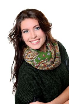 portrait of a beautiful happy woman in a knitted jacket