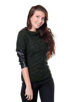 portrait of a beautiful happy woman in a knitted jacket
