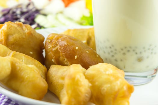 close-up soybean milk and deep-fried dough stick for breakfast