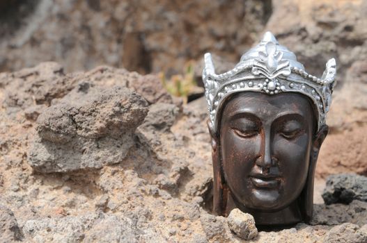 One Ancient Gray Buddha Statue Near The Ocean