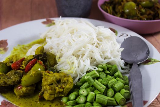 Thai breakfast  green curry with chicken and noodles , kaeng hor