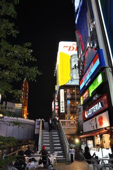 OSAKA, JAPAN - OCT 23: People visit famous Dotonbori street on October 23, 2012 in Osaka, Japan. According to Tripadvisor Dotonbori is the 3rd best attraction to visit in Osaka. 