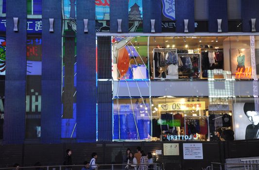 OSAKA, JAPAN - OCT 23: People visit famous Dotonbori street on October 23, 2012 in Osaka, Japan. According to Tripadvisor Dotonbori is the 3rd best attraction to visit in Osaka. 