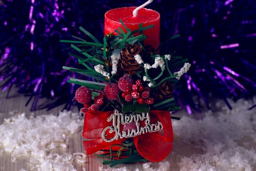 Decorative christmas composition from red candle