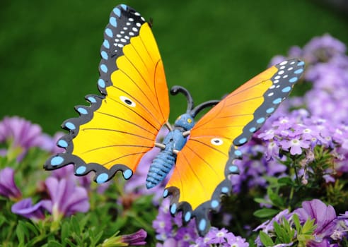 Symbolic butterfly in strong colors.