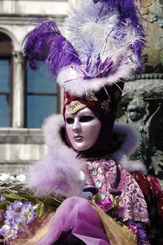 VENICE - MARCH 8: Person in costume at St. Mark's Square during the Carnival of Venice on March 28, 2011.The annual carnival was held in 2011 from February 26th to March 8th.