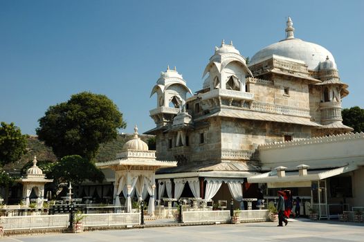 UDAIPUR,RAJASTHAN,INDIA - NOVEMBER 19: tourists visiting beautiful palace at Jag Mandir island on Pichola lake in Udaipur city,so called "India Venice", on November 19,2012 in Udaipur,Rajasthan,Ukraine