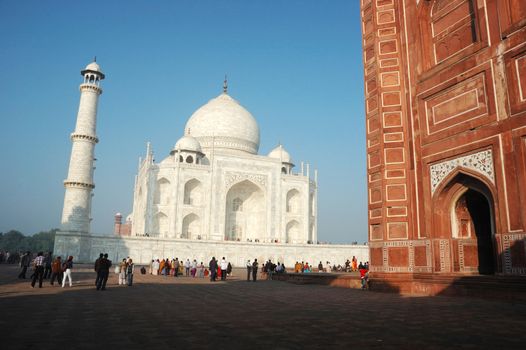 AGRA, UTTAR PRADESH, INDIA - NOVEMBER 18: tourists visiting famous landmark of India - Taj Mahal monument listed as UNESCO World Heritage Site on November 18,2012 in Agra,Uttar Pradesh, India