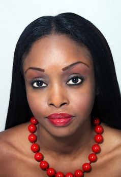 Studio close-up of an extraordinarily beautiful young woman.