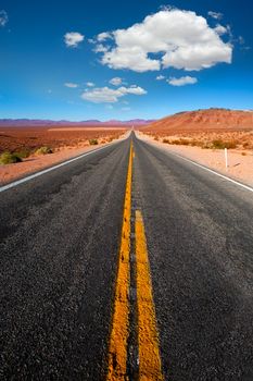 Never ending road to Death Valley California sunny desert