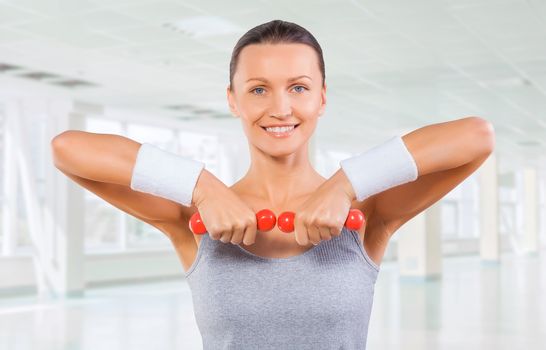sportswoman lifting weights