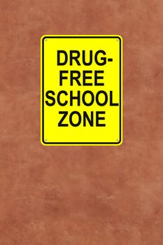 A drug-free school sign mounted on a wall