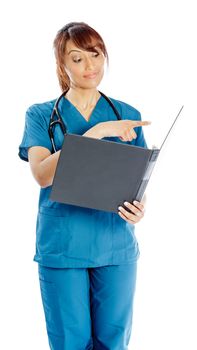 Attractive Indian doctor woman posing in a studio in front of a background