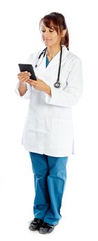 Attractive Indian doctor woman posing in a studio in front of a background