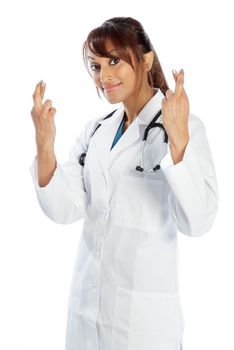 Attractive Indian doctor woman posing in a studio in front of a background