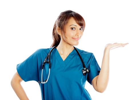 Attractive Indian doctor woman posing in a studio in front of a background