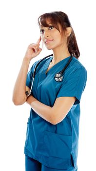 Attractive Indian doctor woman posing in a studio in front of a background