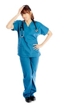 Attractive Indian doctor woman posing in a studio in front of a background