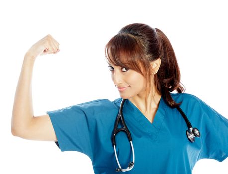 Attractive Indian doctor woman posing in a studio in front of a background