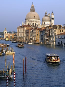 Santa Maria della Salute and the Grand Canal in the city of Venice in northeastern Italy. The city is listed as a UNESCO World Heritage Site, along with its lagoon.