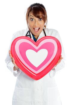 Attractive Indian doctor woman posing in a studio in front of a background