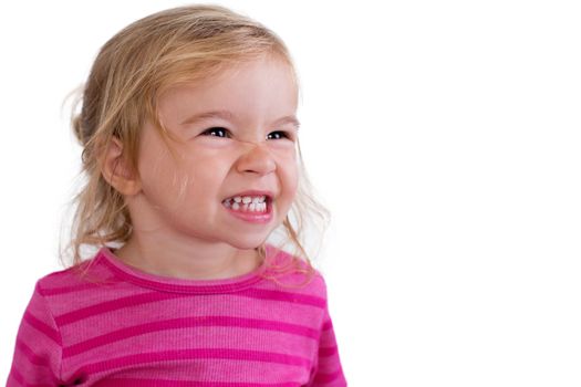 Beautiful toddler giving a large toothy smile with her 18 teeth