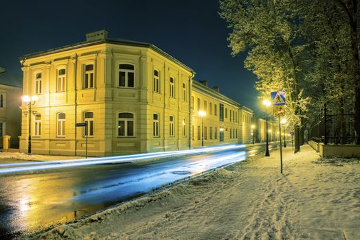 Street in Siedlce, Poland covered with snow at night
