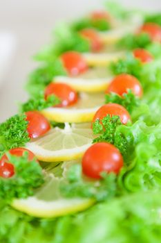 closeup of a salad in top of sandwich cake