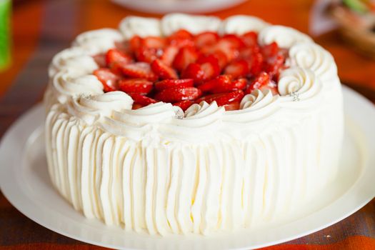 Delicious strawberry cake with strawberries and whipped cream