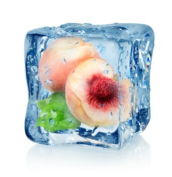 Ice cube and peach isolated on a white background