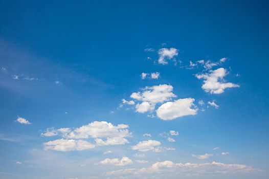 Photo of a beautiful blue sky with white clouds.