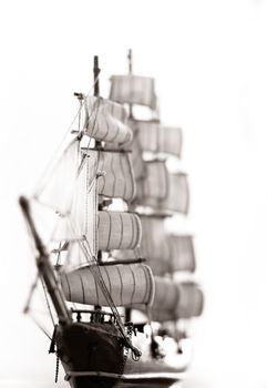 Photo of a model of ship with sails