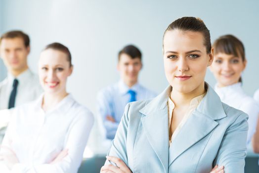 successful businessmen, a portrait of a business woman standing next to colleagues