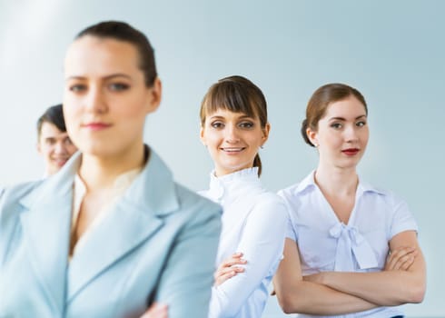 successful businessmen, a portrait of a business woman standing next to colleagues